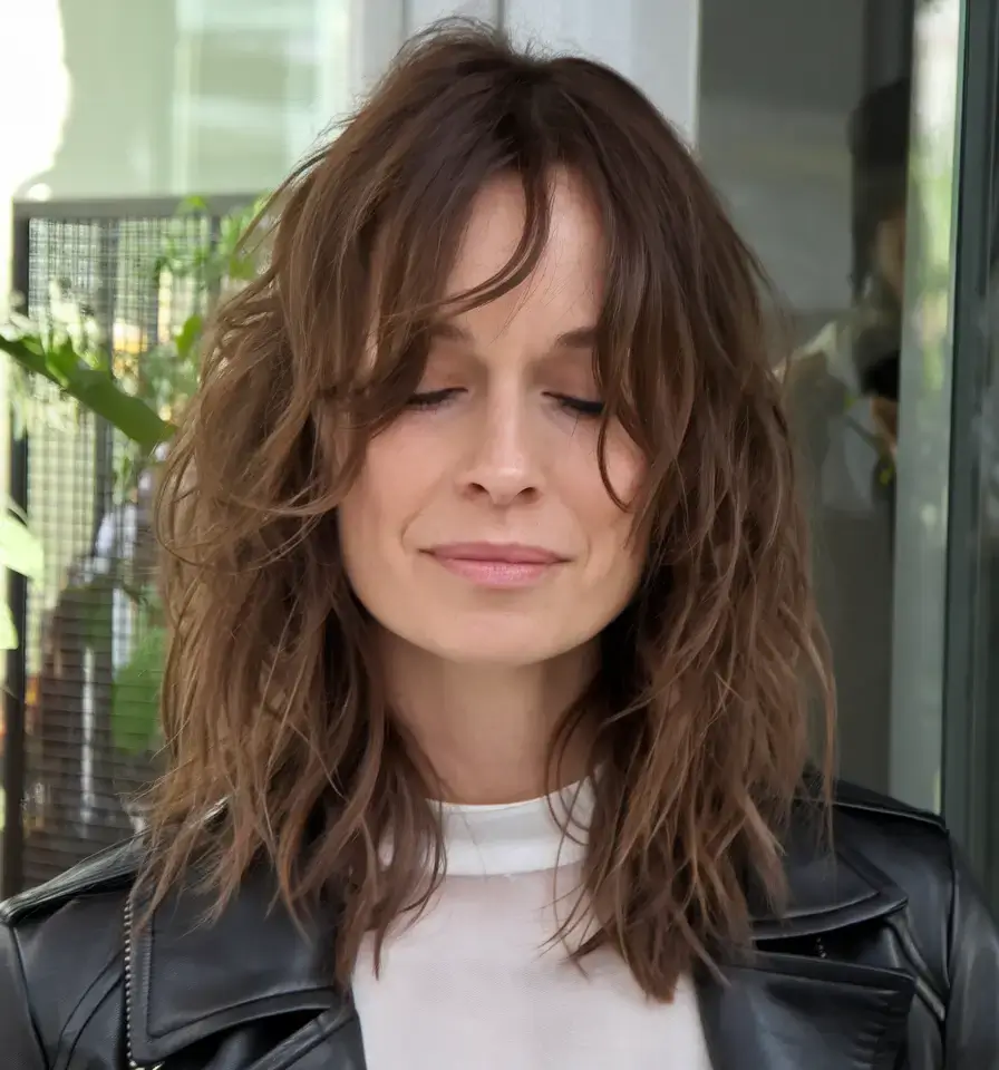 girl haircut summer ideas 2025 Shaggy Mid-Length Cut with Micro Curtain Bangs