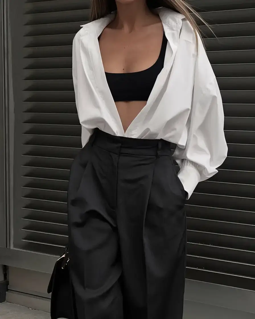 business casual outfit ideas for the summer of 2025 Undone Elegance: Wide Trousers and a Bra Top Layer