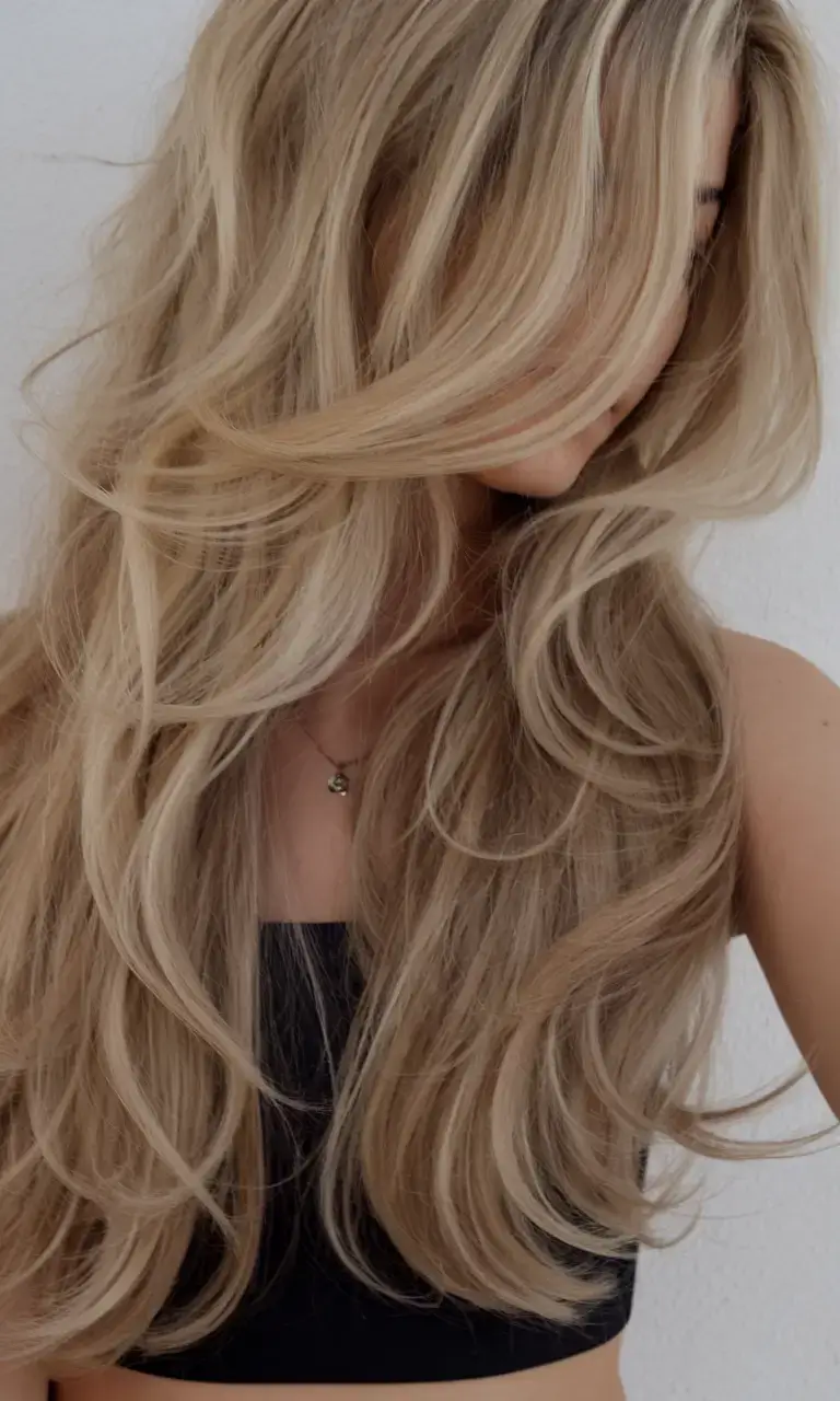 butterfly haircuts summer ideas 2025 Soft Vanilla Blonde with Cascading Movement