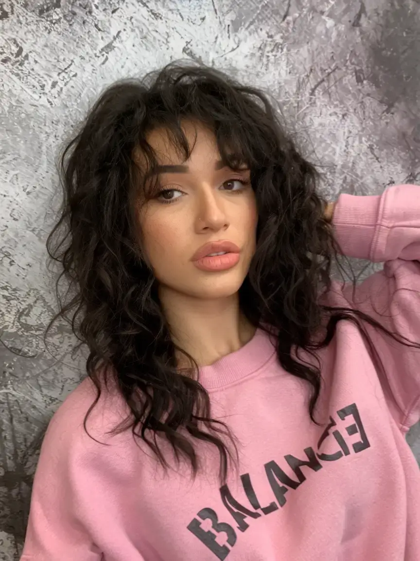 curly haircuts summer ideas 2025 French-Shag Energy with Bangs