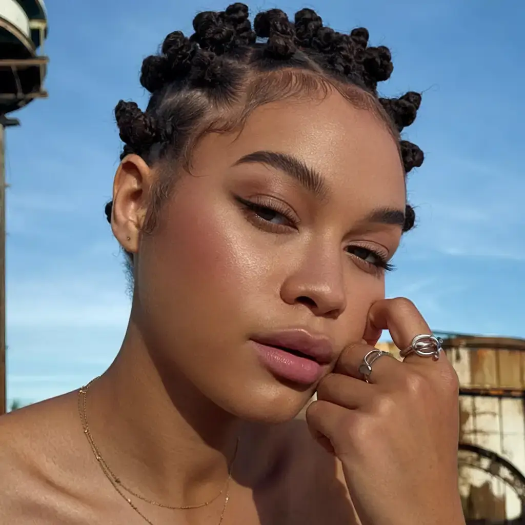 cute natural summer hairstyle ideas 2025 Glossy Bantu Knots with Sculpted Edges