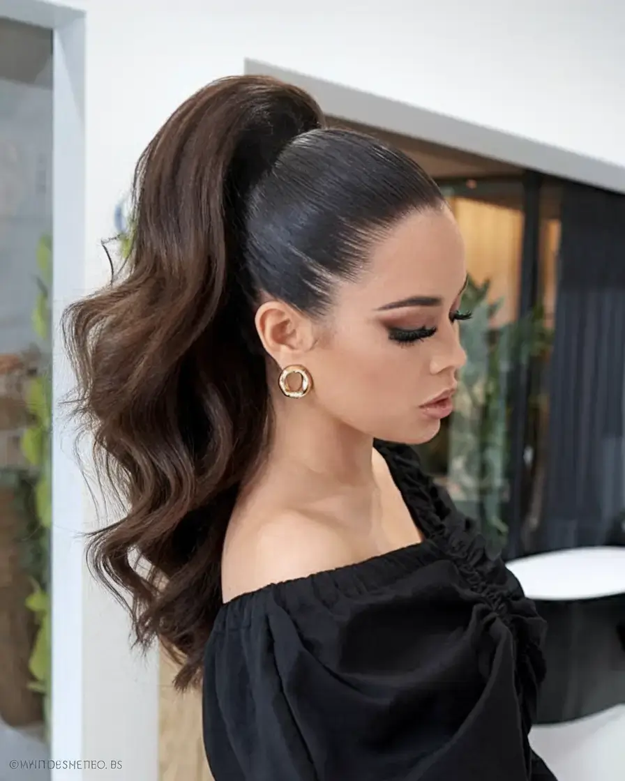 fresh hairstyles for june 2025 Slicked-Back High Pony with Mega Volume