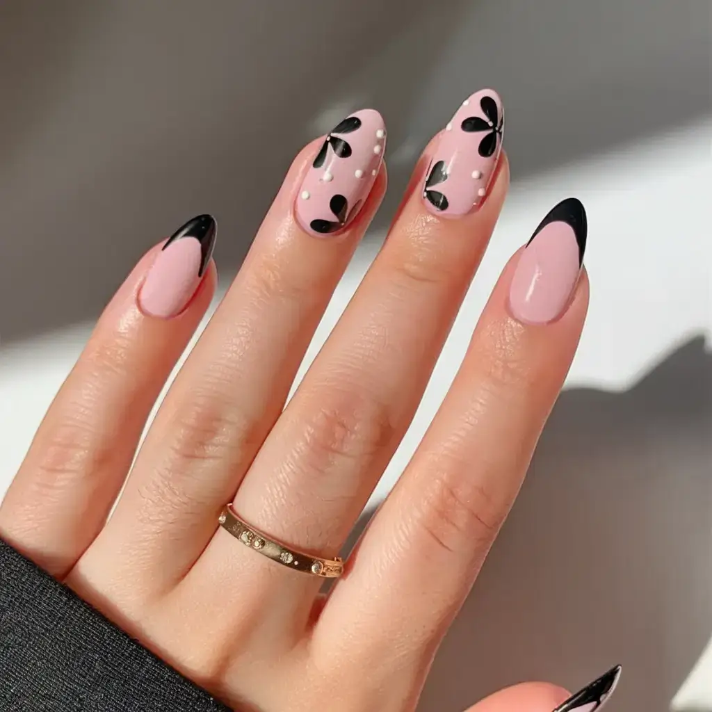 summer almonds nails ideas 2025 Floral Noir French with Petal Dots