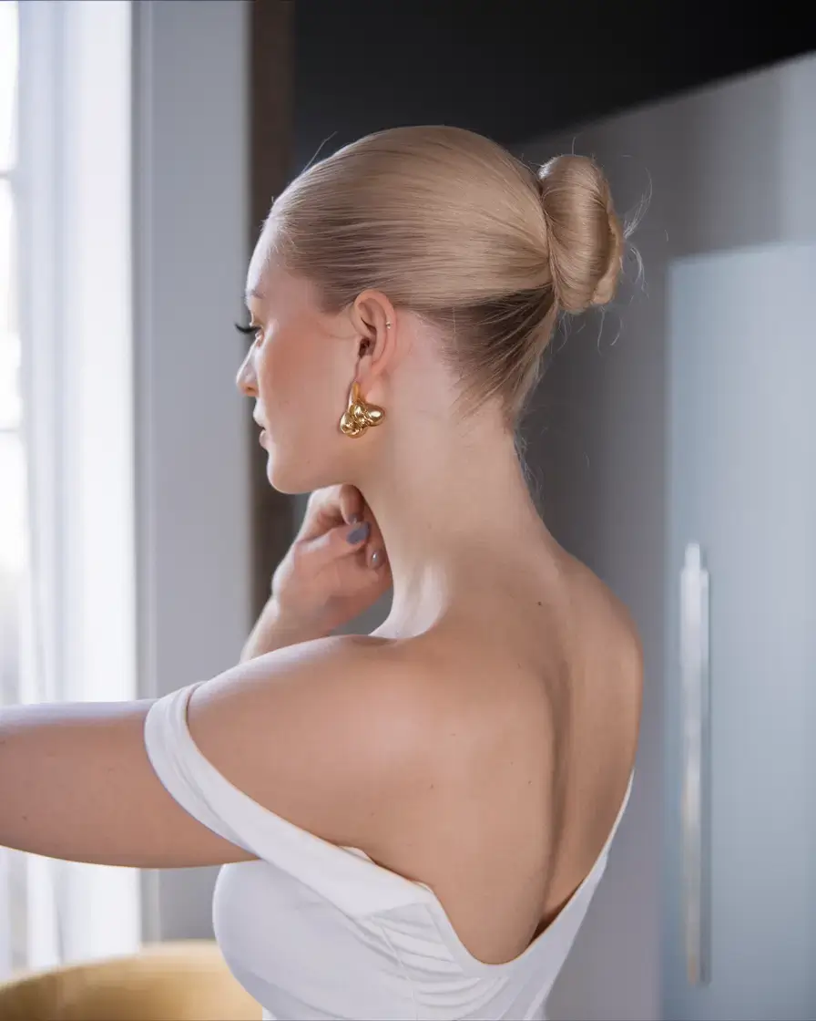 summer buns hairstyle 2025 Power Bun with Runway Energy
