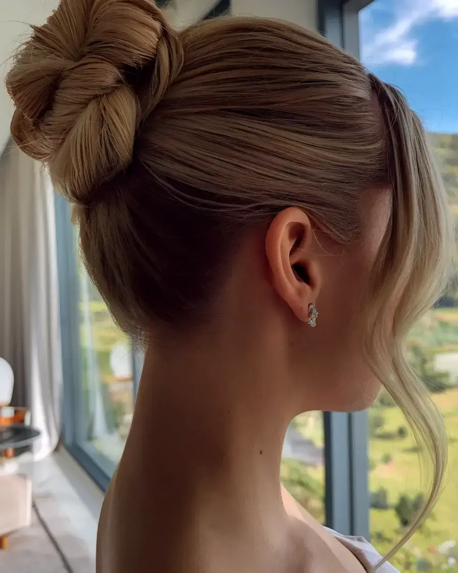 summer buns hairstyle 2025+Sleek Ballerina Bun with a Twist