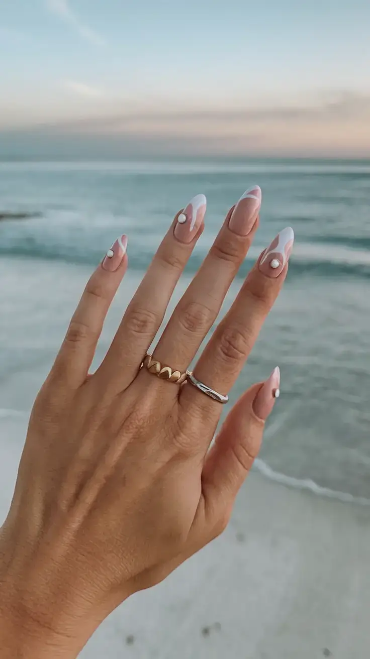 summer nail art ideas 2025 Pearl-Tipped Negative Space Flames