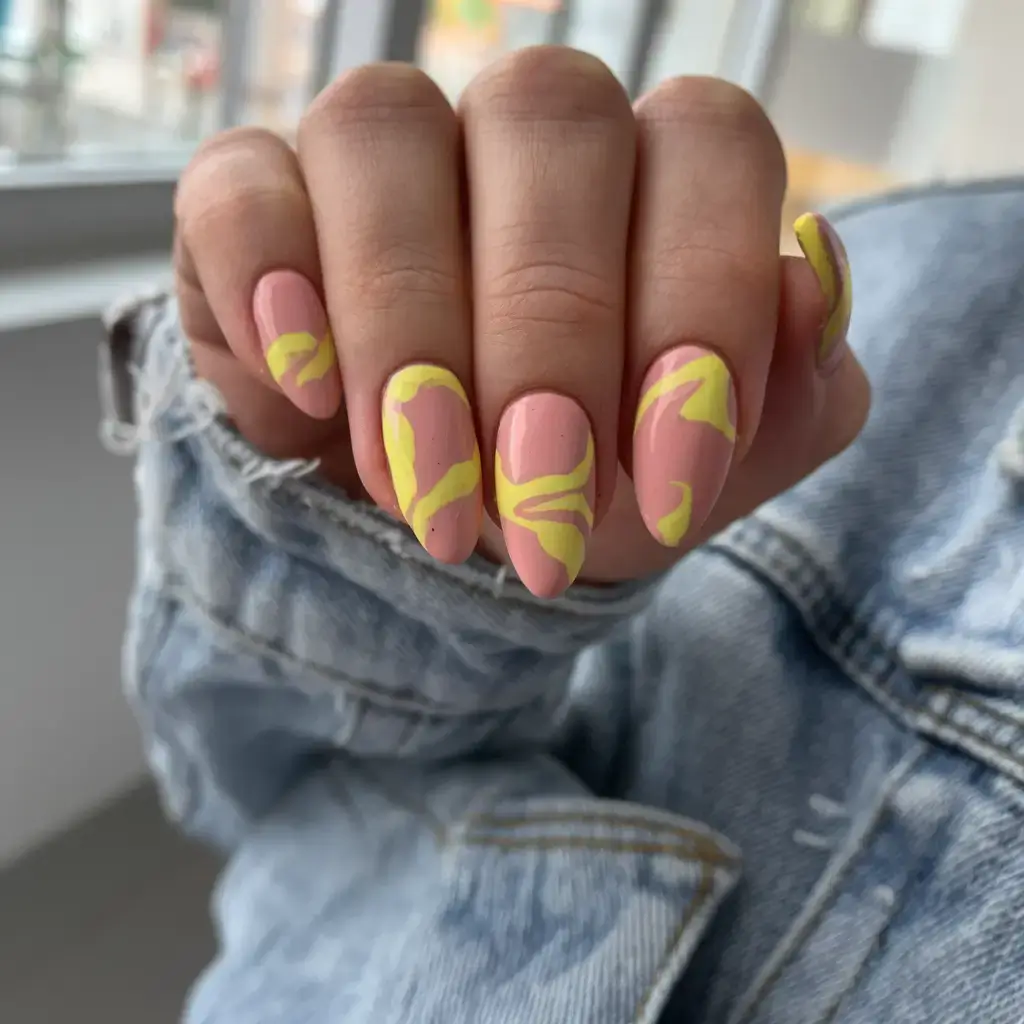 summer nail art ideas 2025 Peach & Lemon Abstract Swirls
