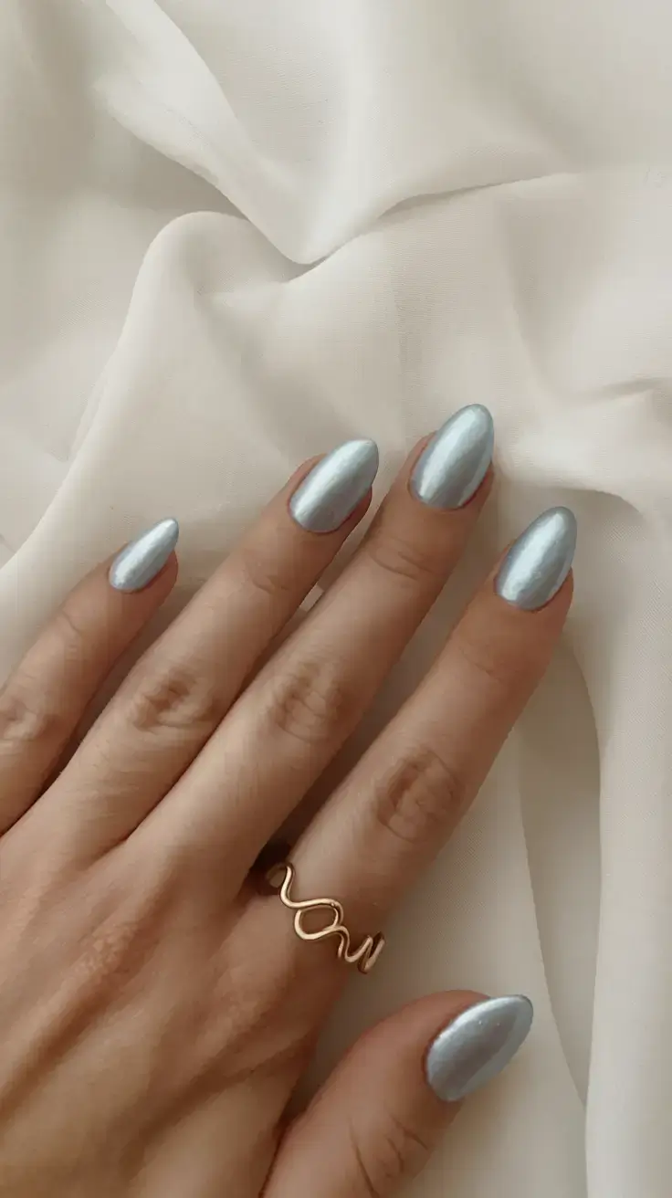 summer nail colors ideas 2025 Liquid Chrome in Soft Silver Blue