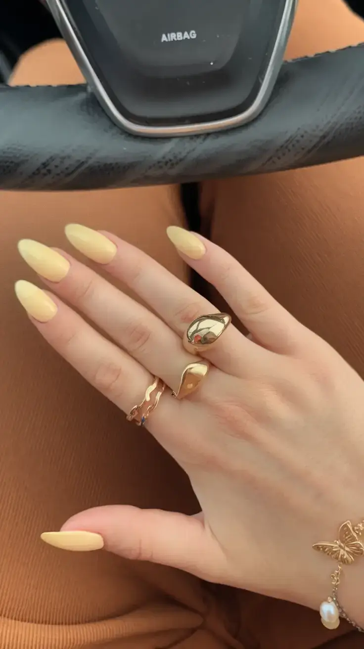 summer nail colors ideas 2025 Soft Lemon Almonds for Golden Hour Vibes