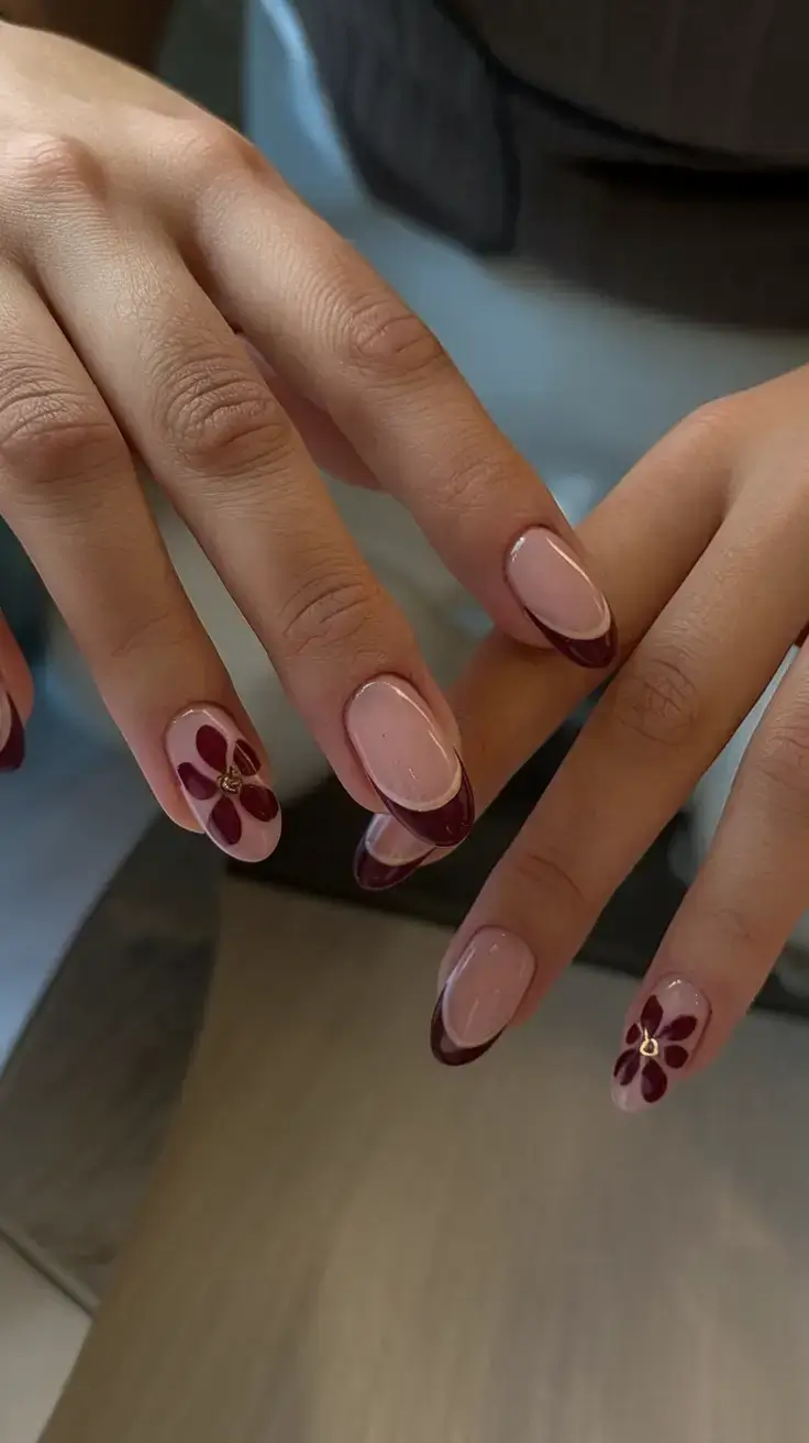 summer nail inspo 2025 Maroon Petal Tips with Golden Centers