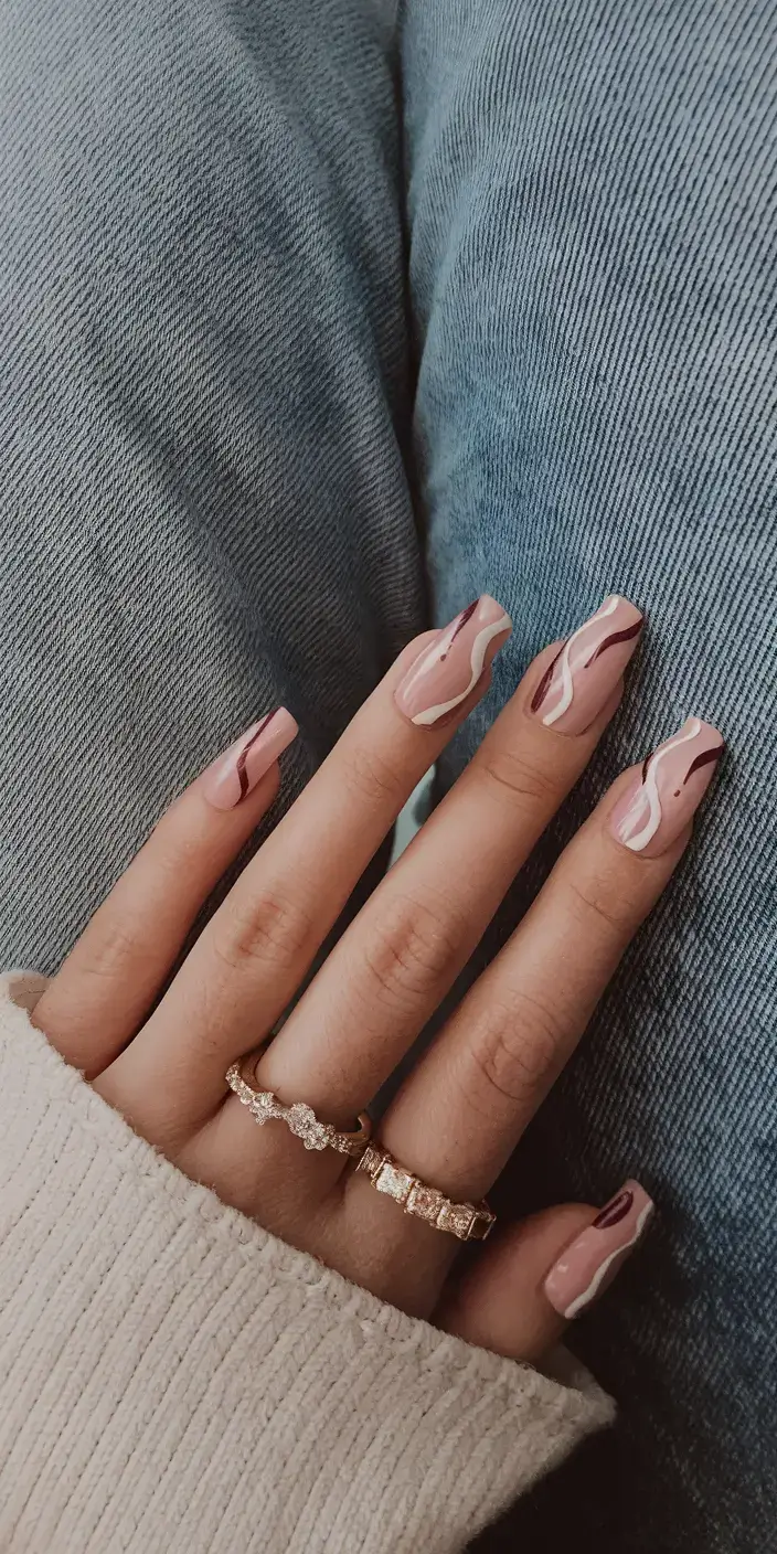 summer nail inspo 2025 Berry Mocha Swirl on a Nude Canvas