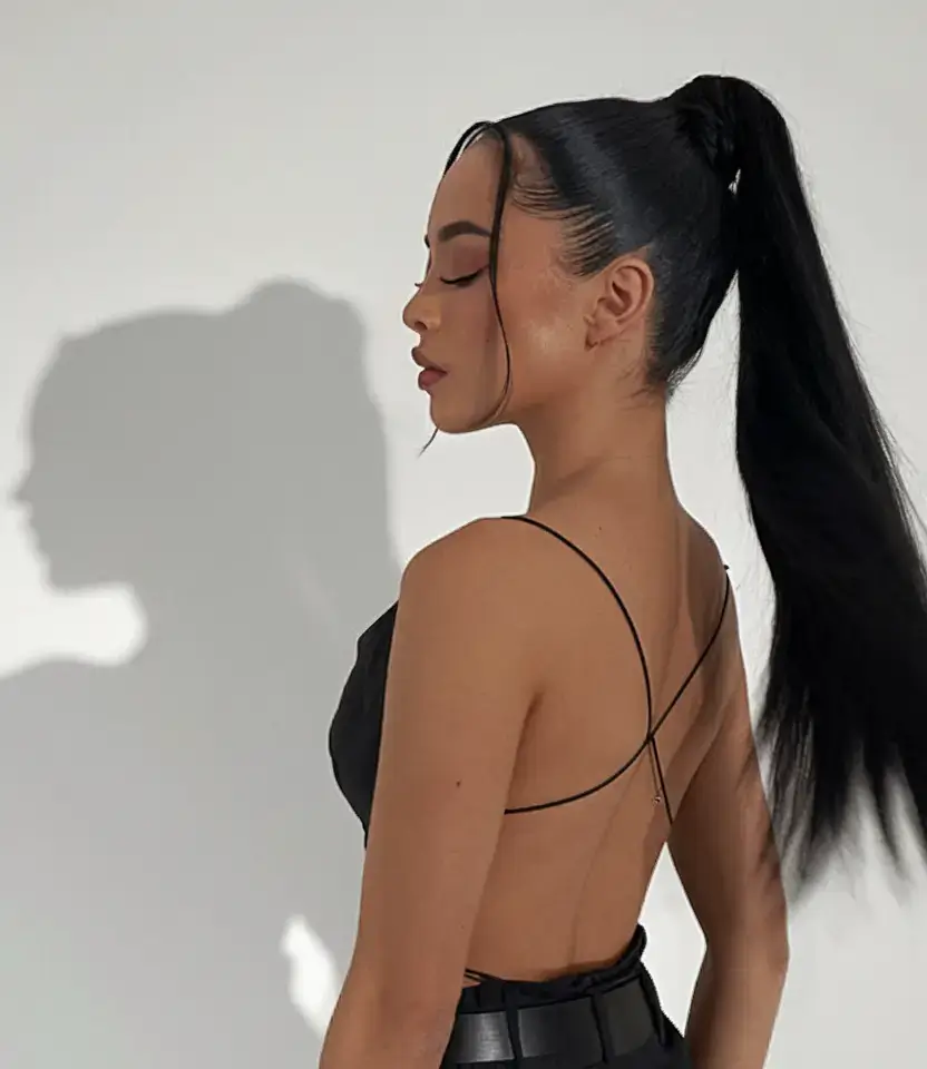 summer ponytail hairstyles 2025 High Jet-Black Statement Pony