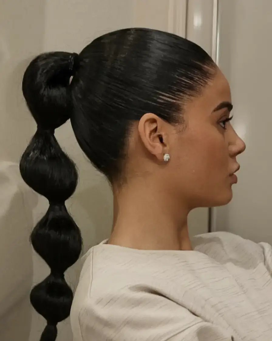 summer ponytail hairstyles 2025 Sculpted Bubble Statement