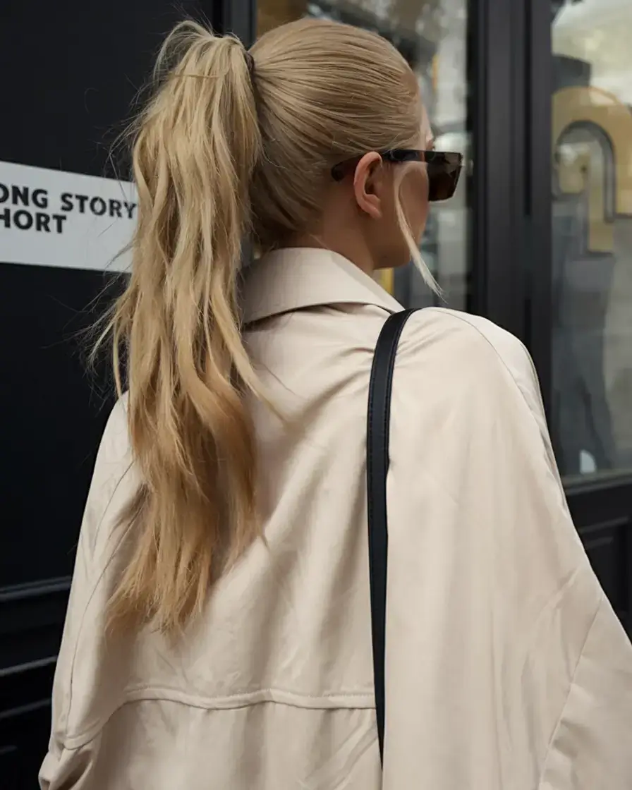 summer ponytail hairstyles 2025 Windblown High Pony with Street Style Edge