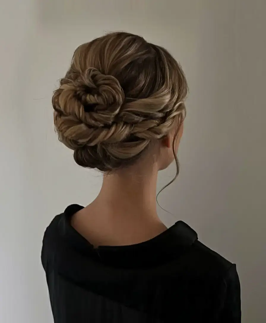 summer updo hairstyles 2025 Twisted Crown Bun with Braid Detail
