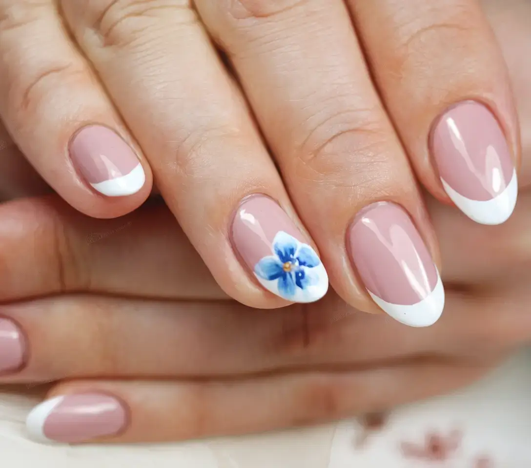 vacation nails ideas 2025 Fresh French with a Floral Twist