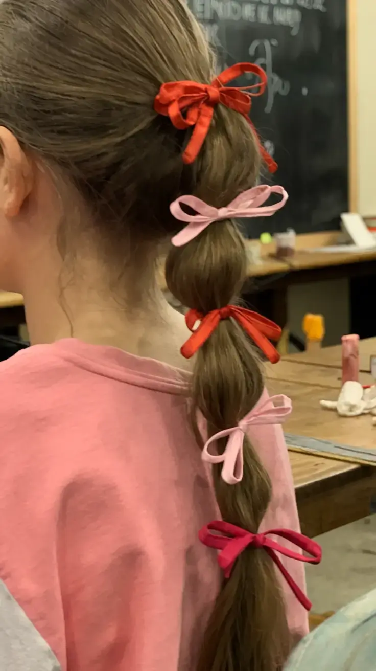 volleyball hairstyles for summer 2025+Bubble Ponytail with Multicolored Bows