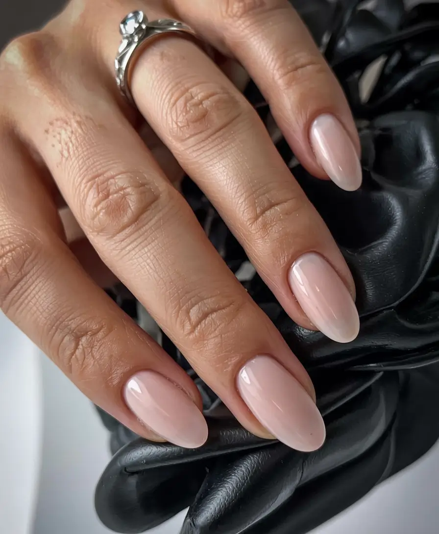 basic but chic summer nails 2025 Soft Peachy Almond