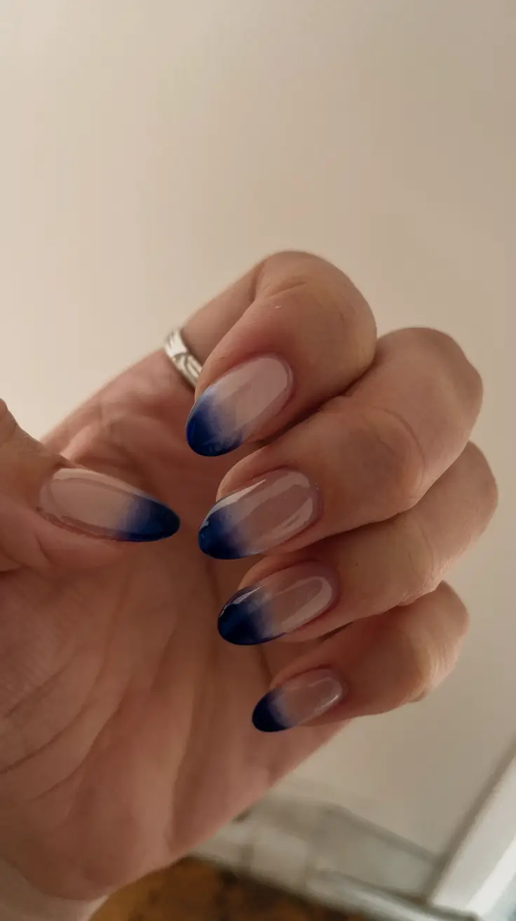 basic but chic summer nails 2025 Midnight Blue French Fade