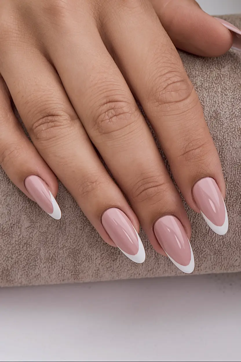basic but chic summer nails 2025 Sharp Almond French