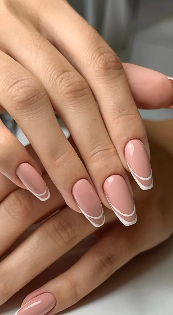 basic but chic summer nails 2025 Modern French Swirl