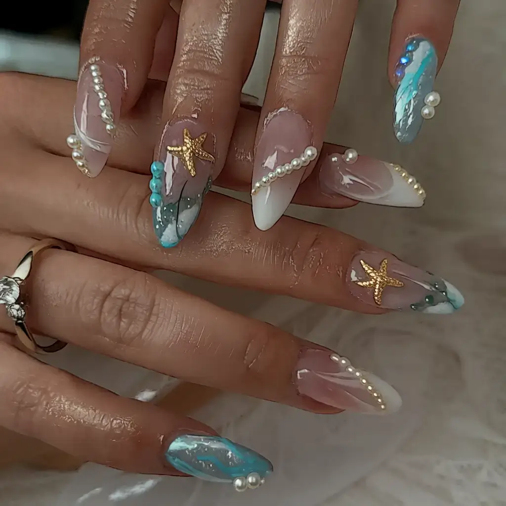beach nails that shine in summer 2025 Shimmering Shell Waterscape