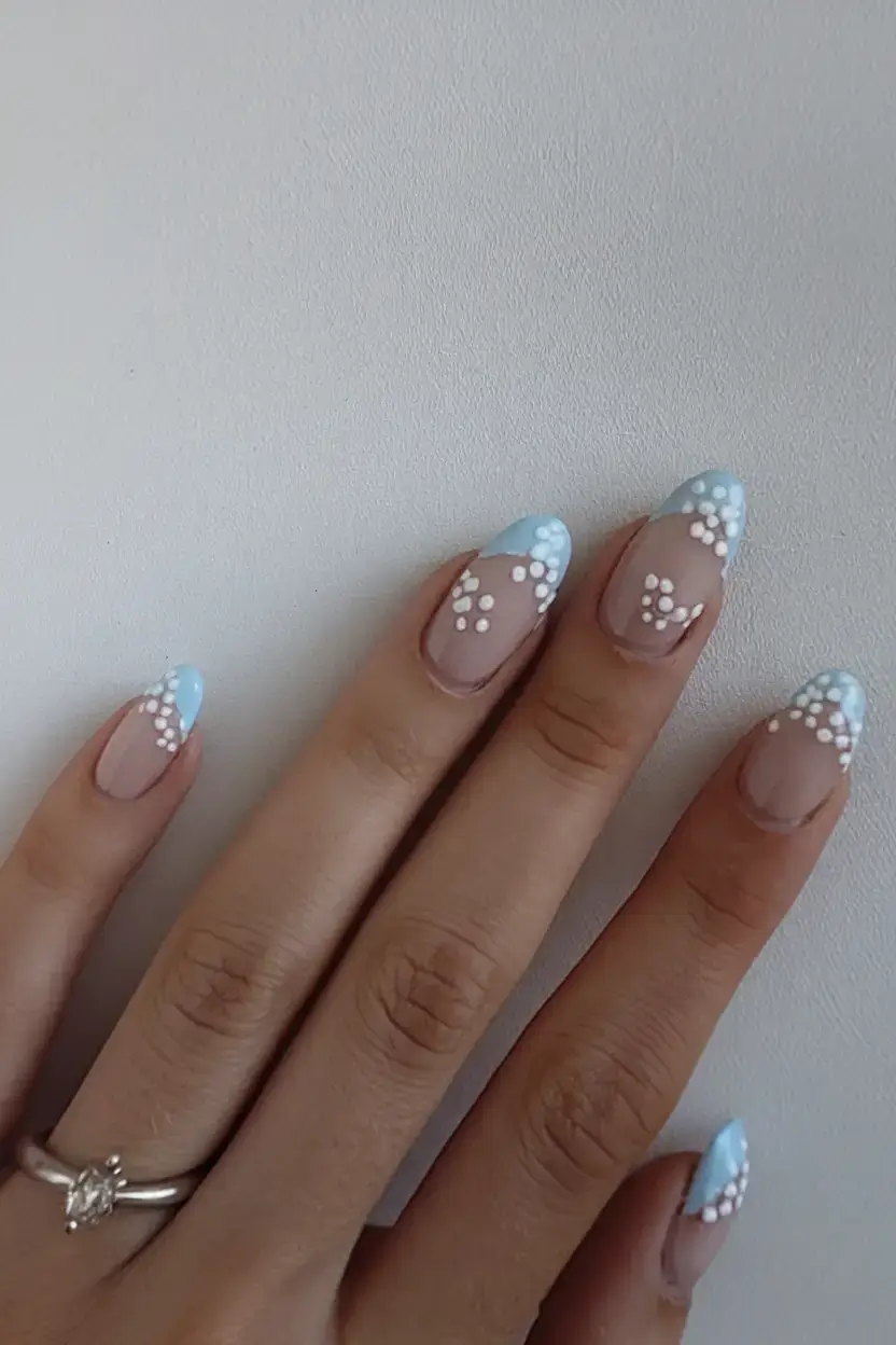 beach nails that shine in summer 2025 Soft Blue French with Dotted Blooms