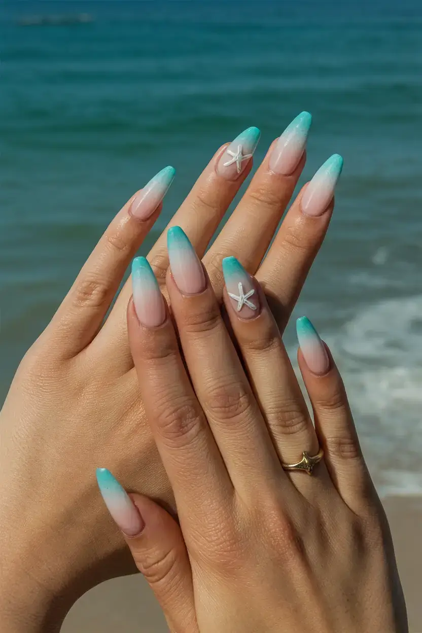 beach nails that shine in summer 2025 Turquoise Fade with Starfish Charm