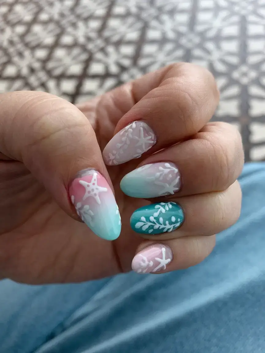beach nails that shine in summer 2025 Mermaid-Inspired Pastel Reef