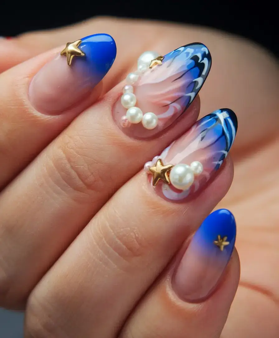 beach nails that shine in summer 2025 Pearls and Midnight Starfish