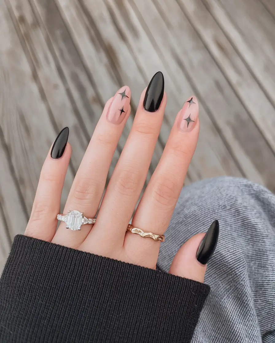 black summer nails that pop in 2025 Modern Nude & Black Starburst Combo