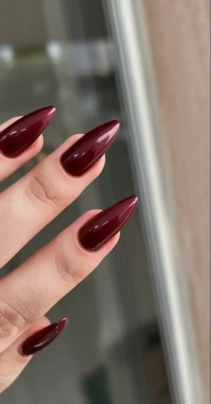 bold red nails for summer 2025 vibes Vampy Almond Perfection: The Dark Siren Look