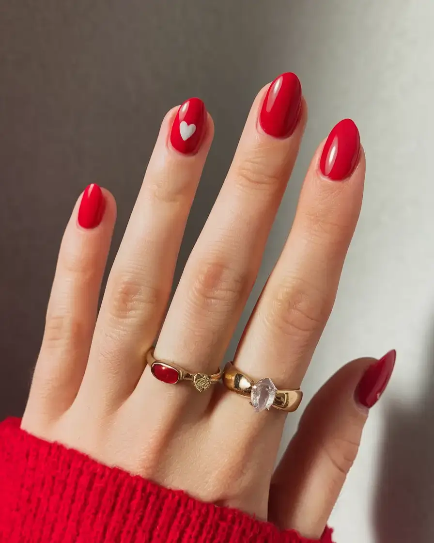 bold red nails for summer 2025 vibes Playful Minimalism: The Accent Heart Look