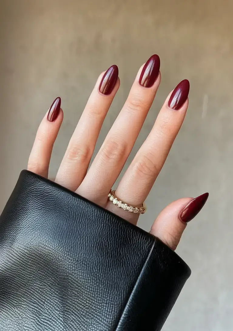 bold red nails for summer 2025 vibes Rich Garnet Almonds: The Jewelry-Inspired Look