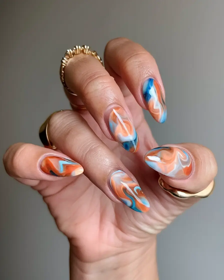 colorful summer nails to try in 2025 Desert Marble Vibes