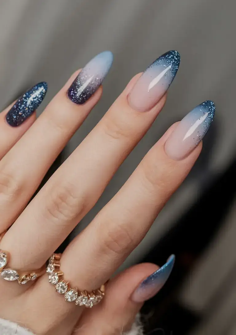 cool blue nail ideas for summer 2025 Galaxy Blue Glitter Fade