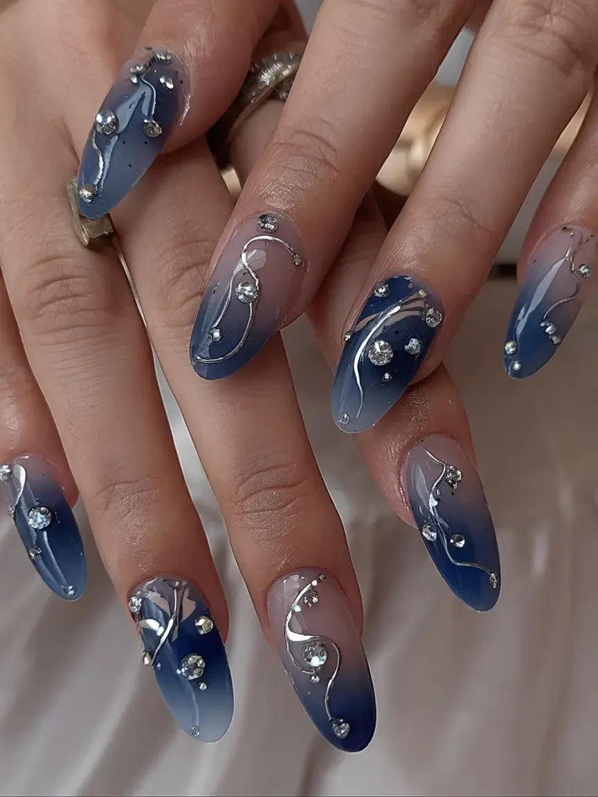 cool blue nail ideas for summer 2025 Midnight Lagoon With a Bit of Magic