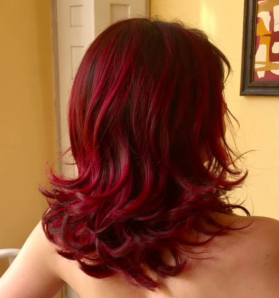 fall red hair color ideas 2025 Cranberry Flip with Polished Volume