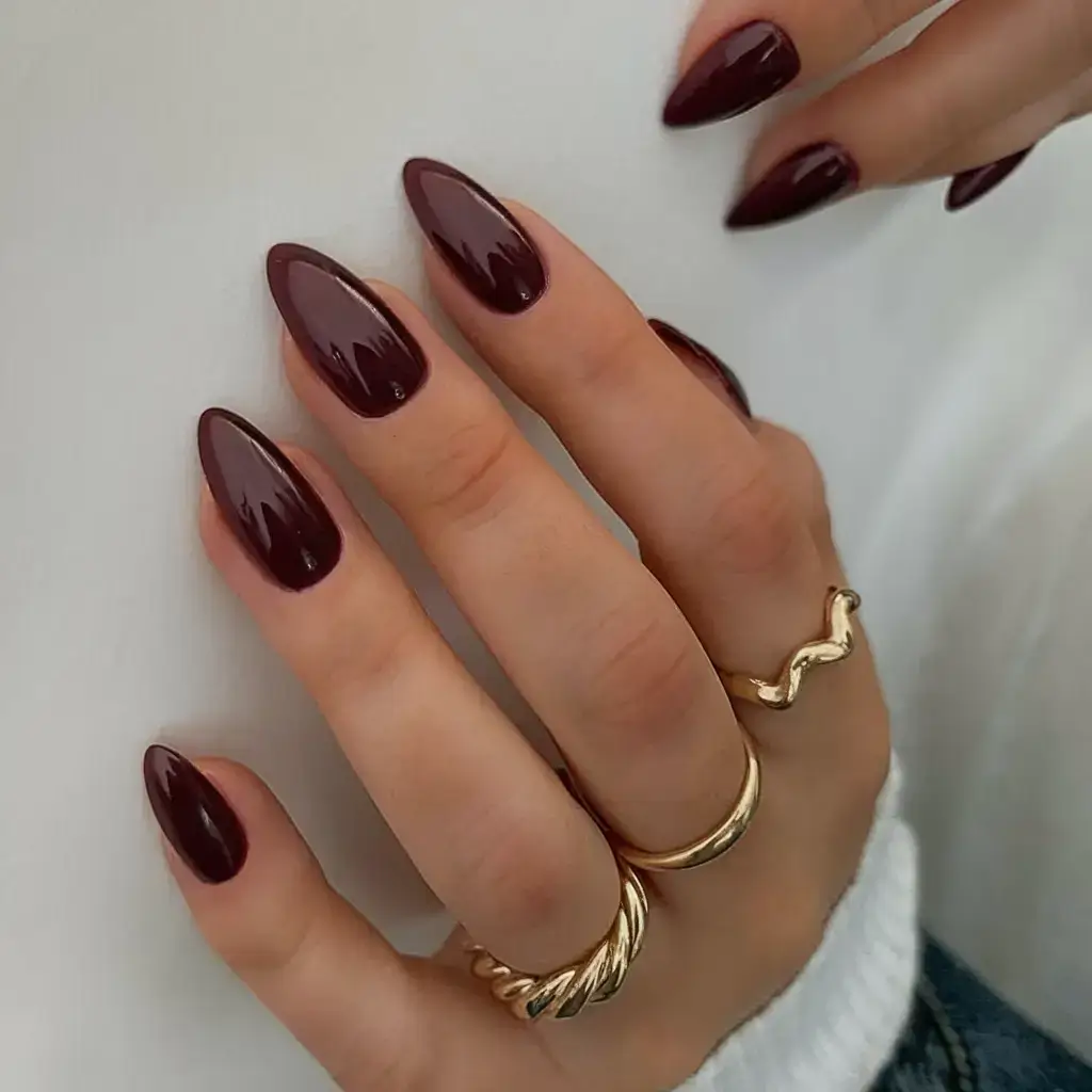oval nail inspo for summer 2025 looks Glossy Wine for Bold Evenings