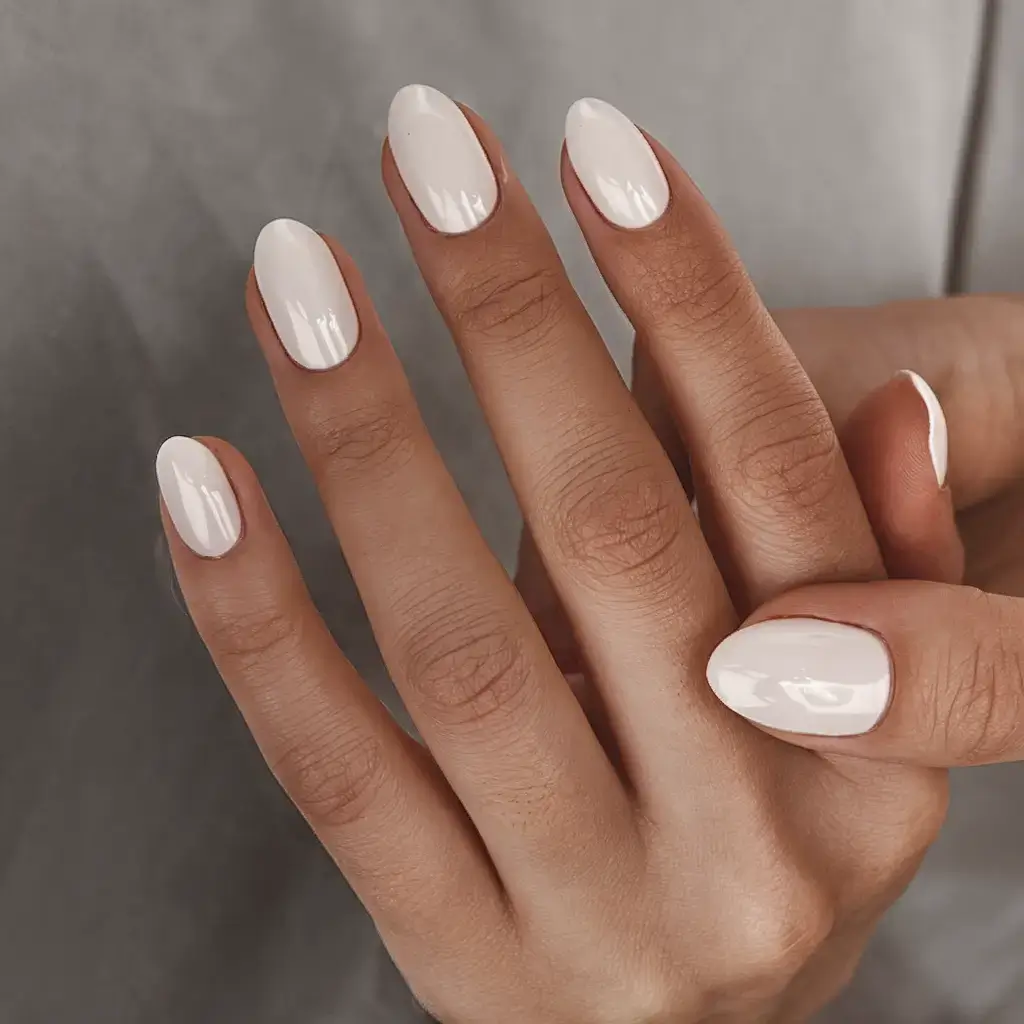 oval nail inspo for summer 2025 looks Creamy Porcelain White for High-Contrast Minimalism