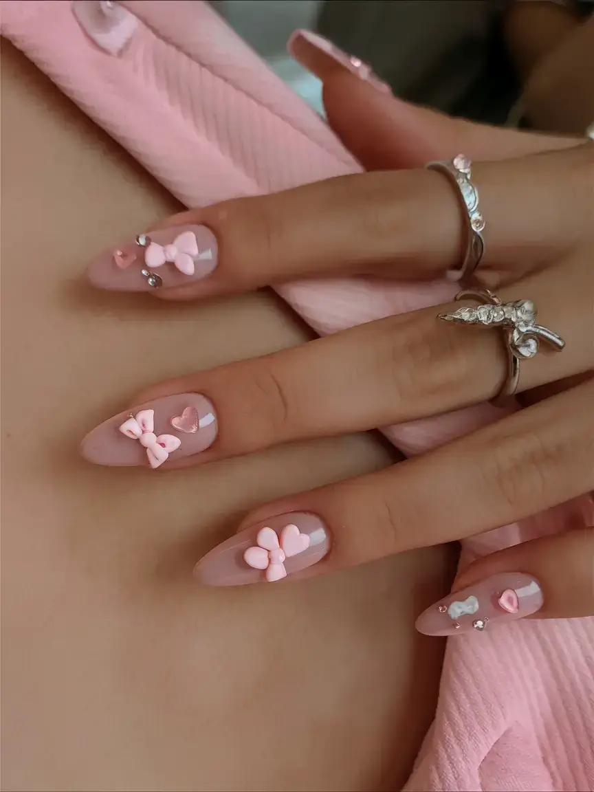 prettiest pink nails for summer 2025 Glossy Pink with 3D Bows & Heart Gems