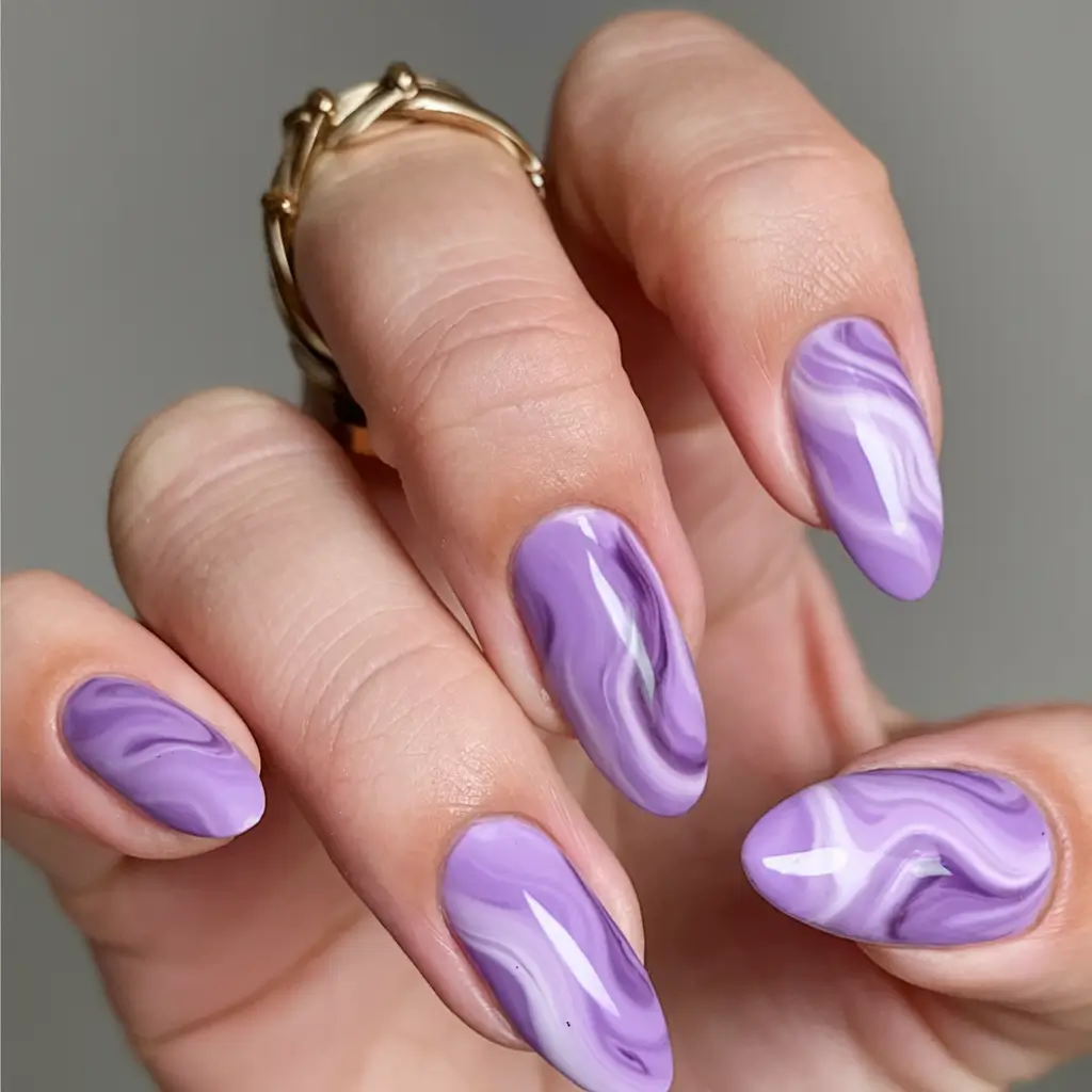 purple summer nails youll love in 2025 Swirled Marble Lilac For Soft Artistry