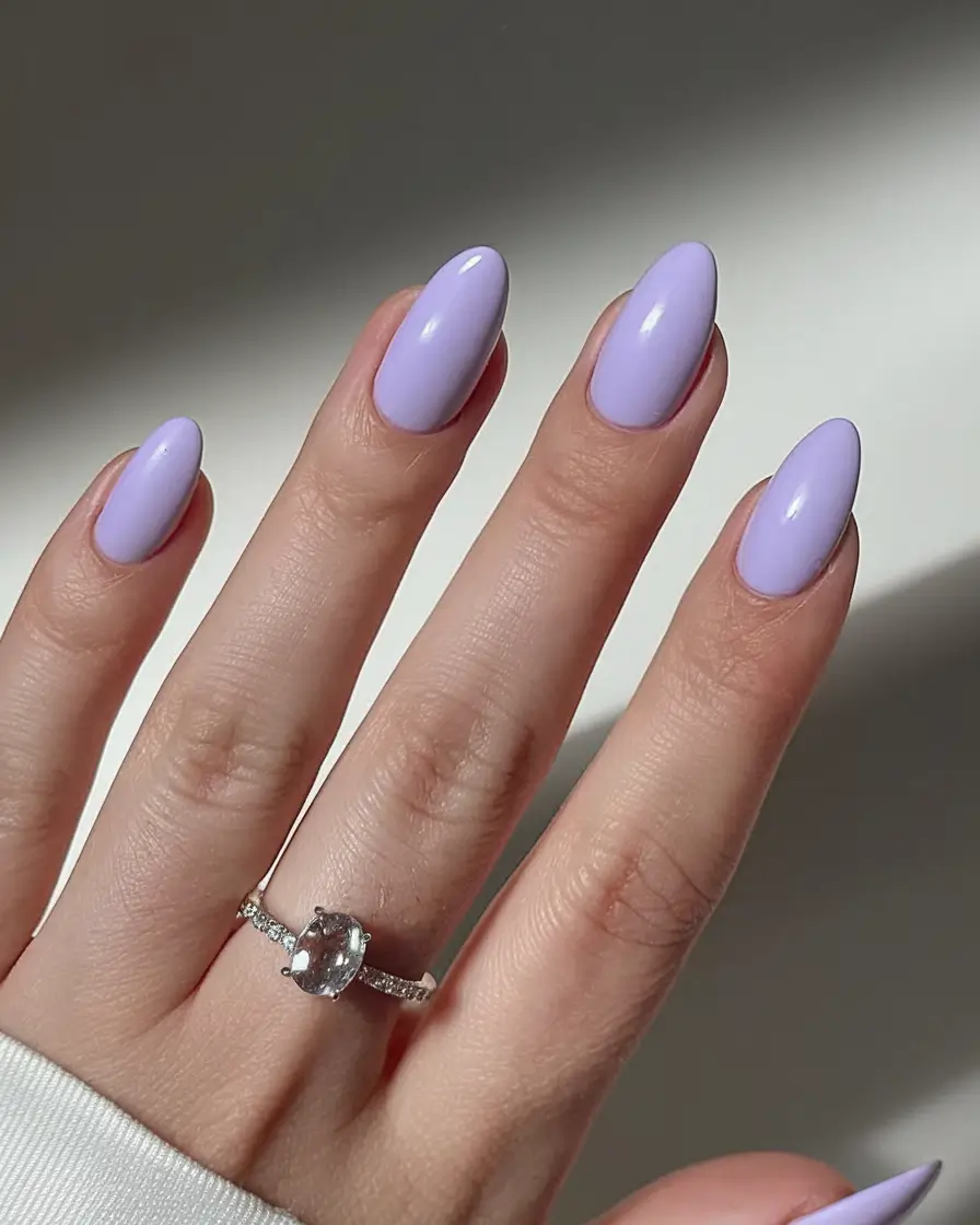 purple summer nails youll love in 2025 Subtle Lilac Gloss With Elegant Oval Shape