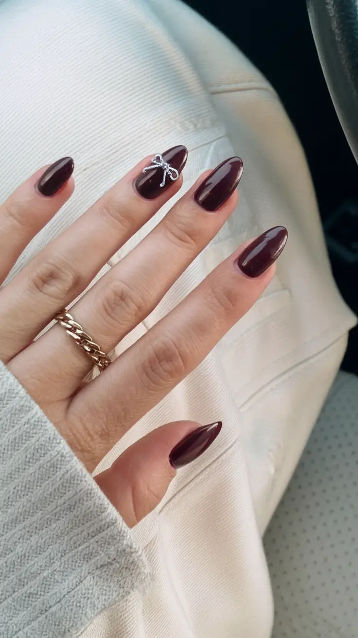 red summer nails that pop in 2025 Classic Garnet with Minimal 3D Detail