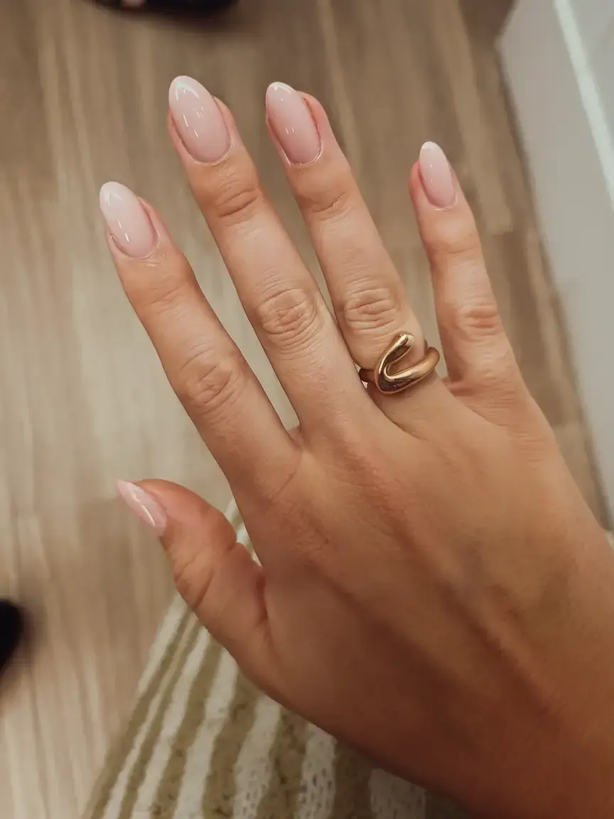 round summer nails that slay in 2025 Milky Nude Elegance