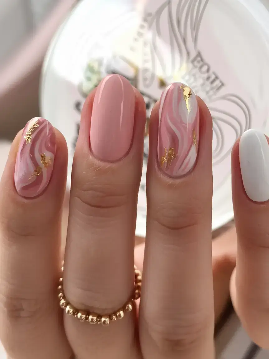 round summer nails that slay in 2025 Marble Pink With Gold Leaf Drama
