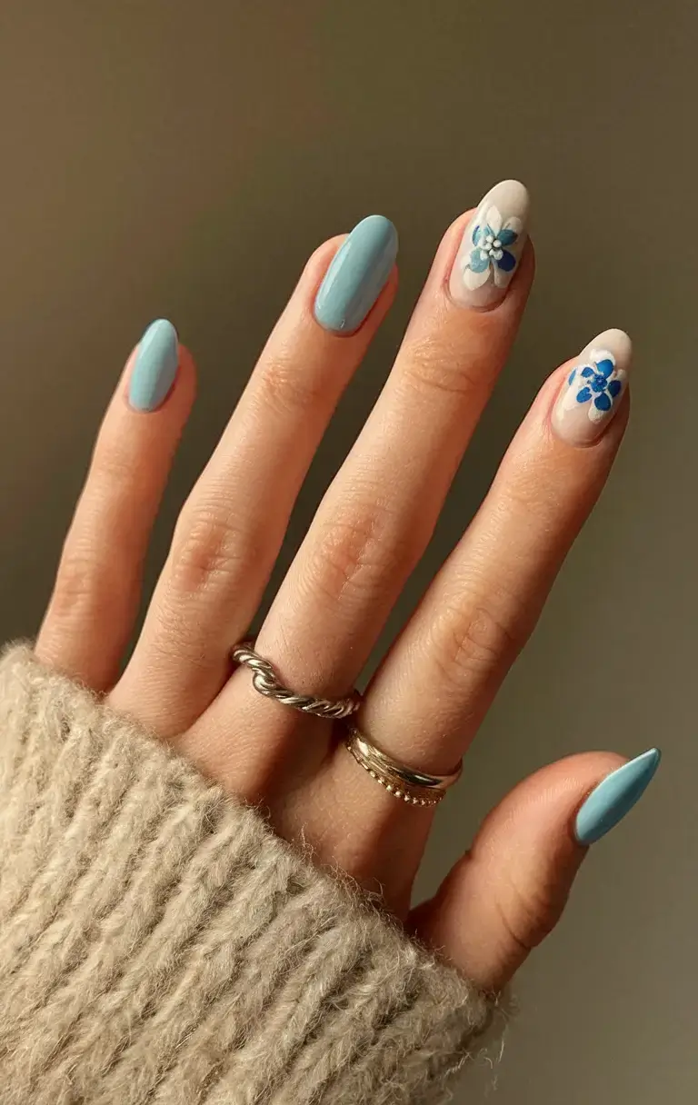round summer nails that slay in 2025 Sky Blue Floral Mix