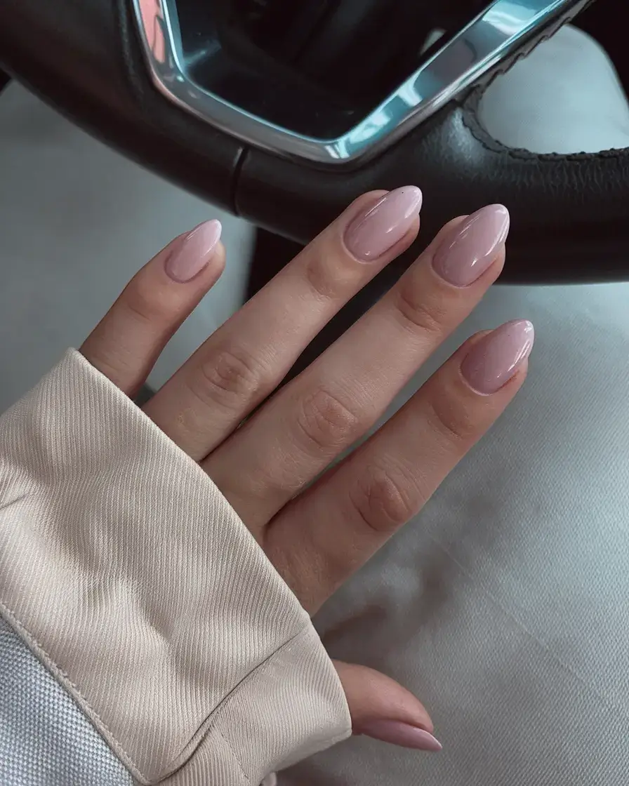 round summer nails that slay in 2025 Rose Quartz Almond Glow