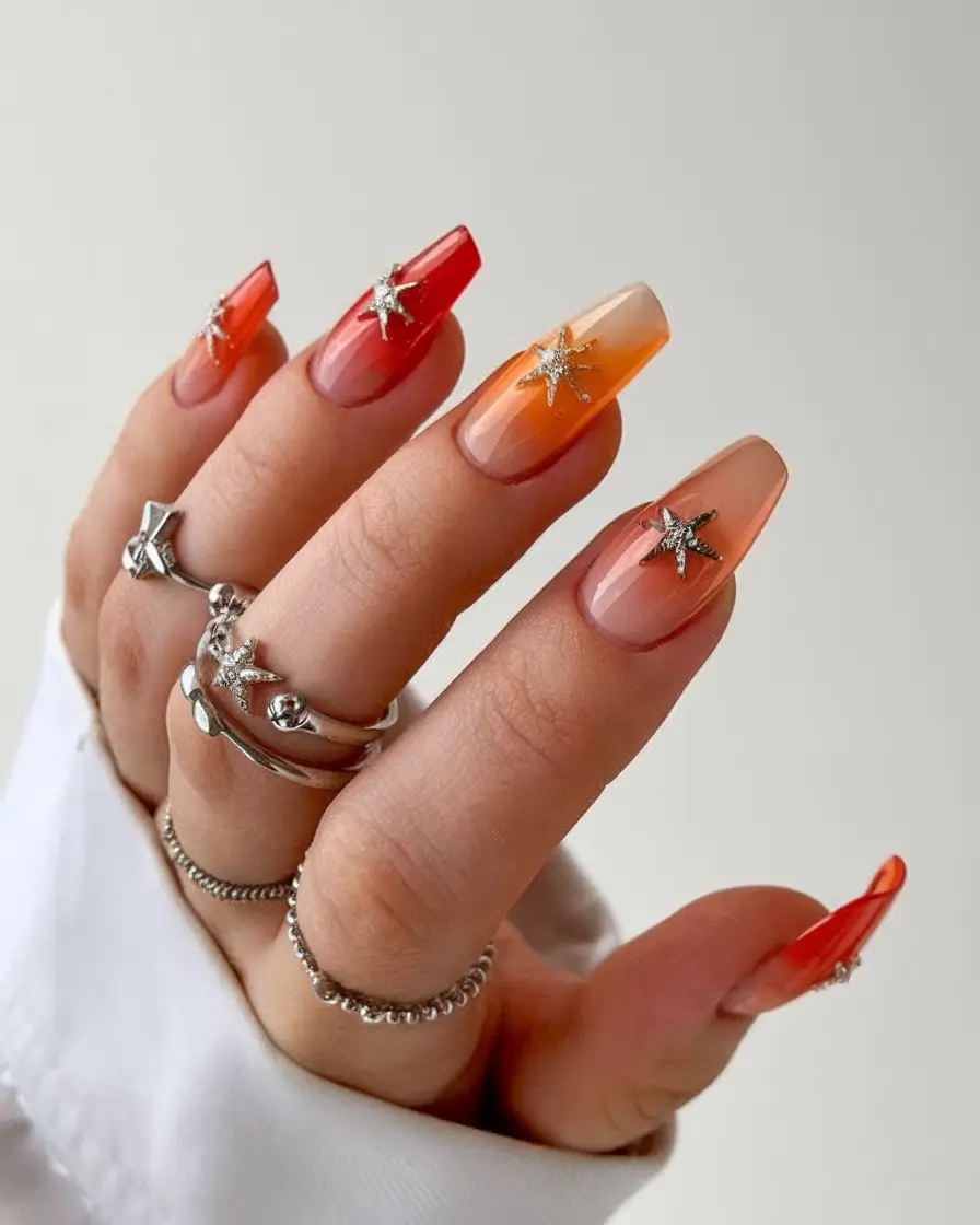 sunset gradient nails to glow in 2025 Solar Flare Glam: Metallic Starbursts on Sunset Ombre