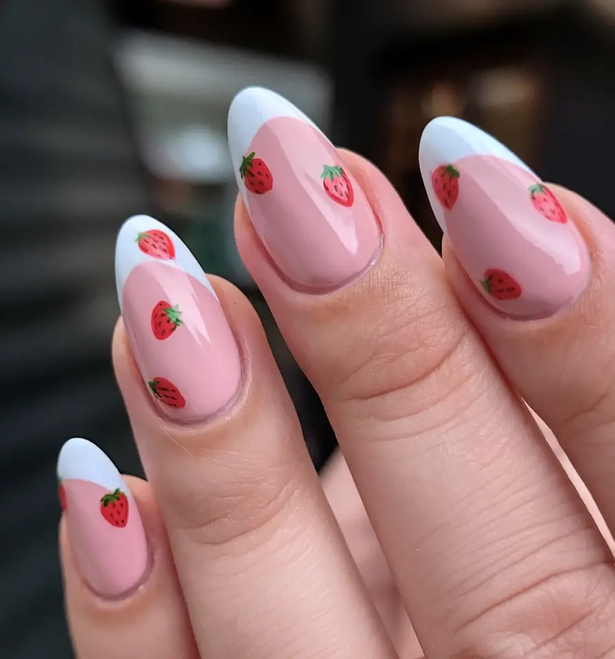 sweet strawberry nails to try in 2025 Minimalist French with Tiny Strawberries